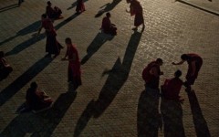 Debating in the evening in front of the temple