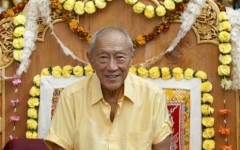 Rinpoche sitting on the adorned thrown after the Ceremony of Enlightenment