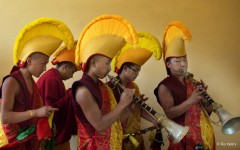 Monks guiding Rinpoche into the temple